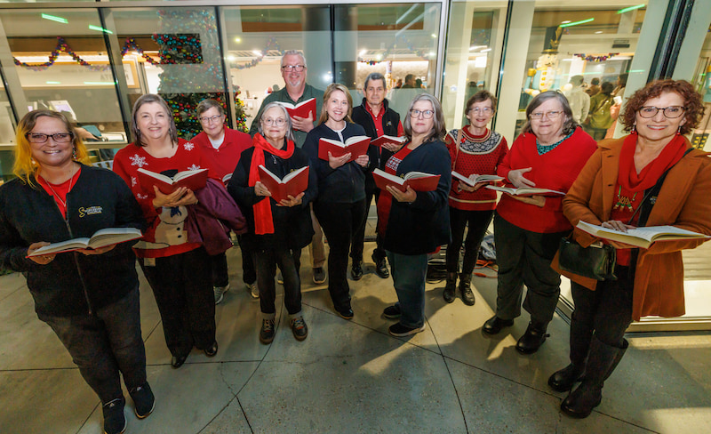 Members of the Mississippi Chorus sang carols as part of BankPlus Presents Light-A-Light.