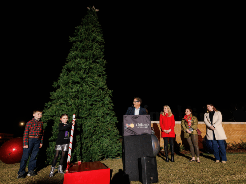 Children's of Mississippi patient Addie Hamm flips the switch to light the Children's of Mississippi Christmas tree.