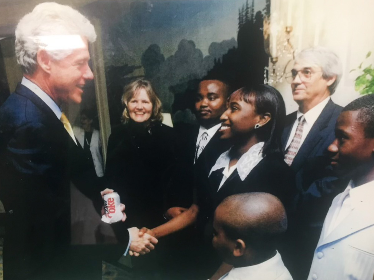 Randle and other students of the Delta Blues Museum Band meeting President Bill Clinton at the USDOT Conference "Delta Visions, Delta Voices, Mississippi Delta Beyond 2000: A National Conference."