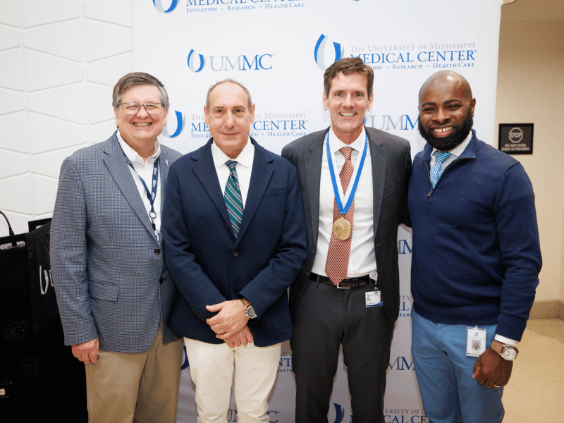 Dr. Dobbs (third from left), with Dr. Daniel Edney, MSDH state health officer, Dr. Paul Byers, associate professor of preventive medicine, and Dr. Justin Turner, MSDH chief medical officer.