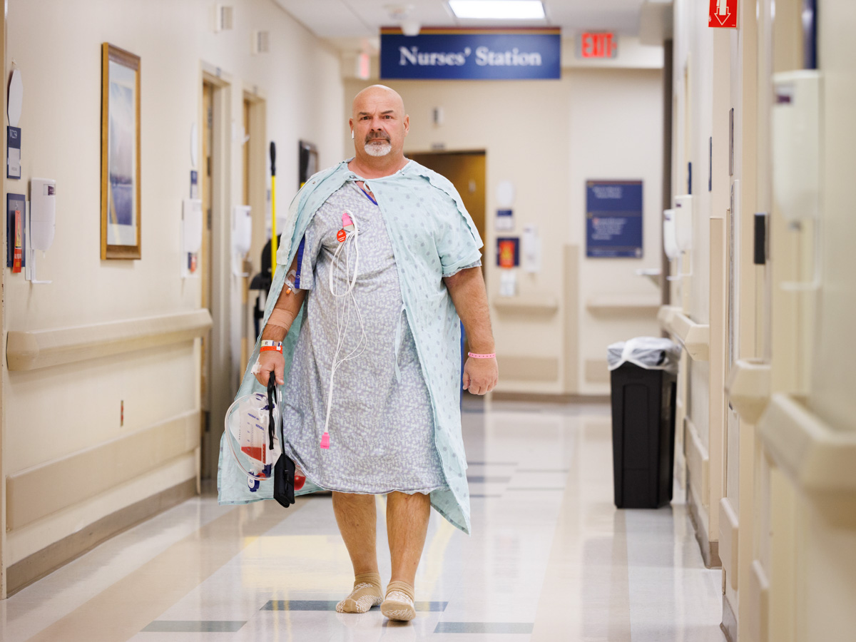 Madison Ridgeland Academy head football coach, Herbert Davis, makes laps around the hospital floor after surgery. Joe Ellis/ UMMC Photography