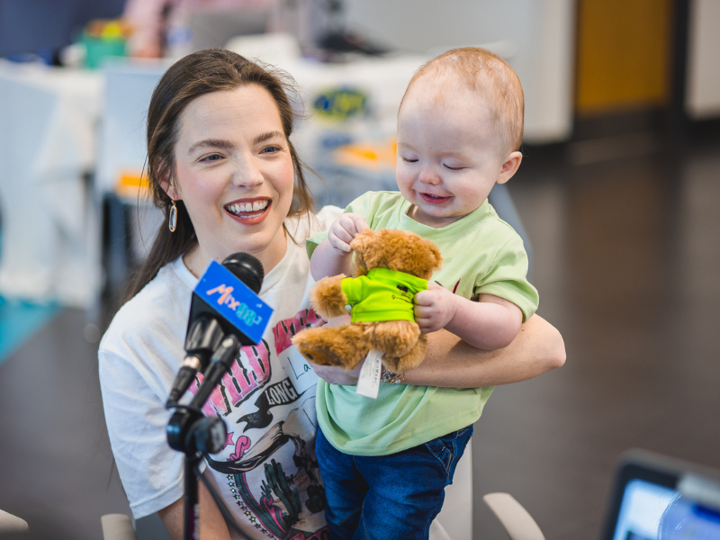 Laura Ricks holds baby Wade, who celebrated his first birthday during the 2023 Mississippi Miracles Radiothon.
