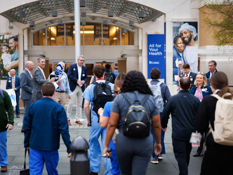 Medical Center leadership gathers to greet faculty and staff as they arrive for Patient Safety Week.