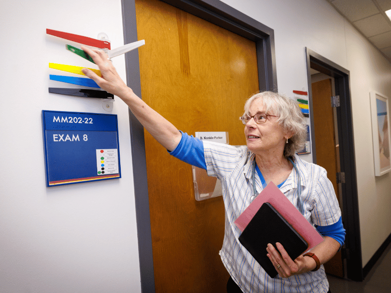 Dr. Debbie Konkle-Parker completes a check-up on her last day serving the Adult Special Care Clinic.