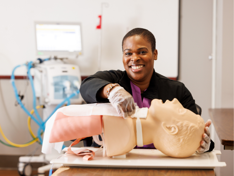 Liza Owens, who is earning a master's degree in the Health Systems Administration program, is a registered respiratory therapist and works at UMMC as a tracheostomy educator.
