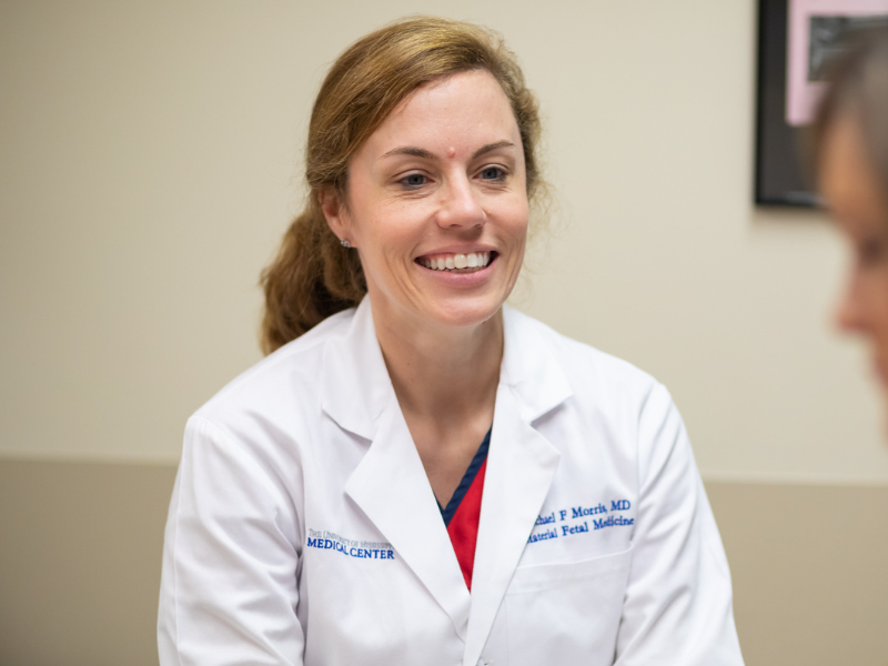 Dr. Rachael Morris talks with a patient at UMMC's Center for Maternal Fetal Medicine in a file photo.