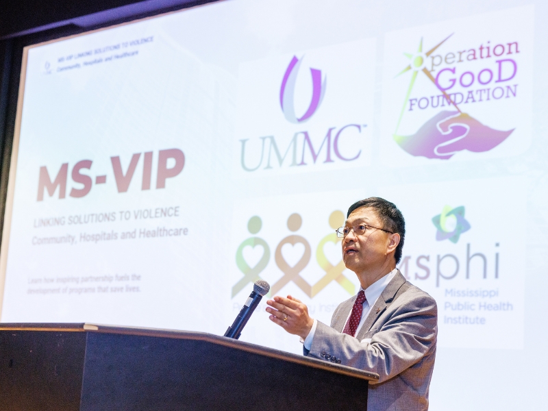 Dr. Lei Zhang welcomes attendees to the third annual Mississippi Linking Solutions to Violence Summit.