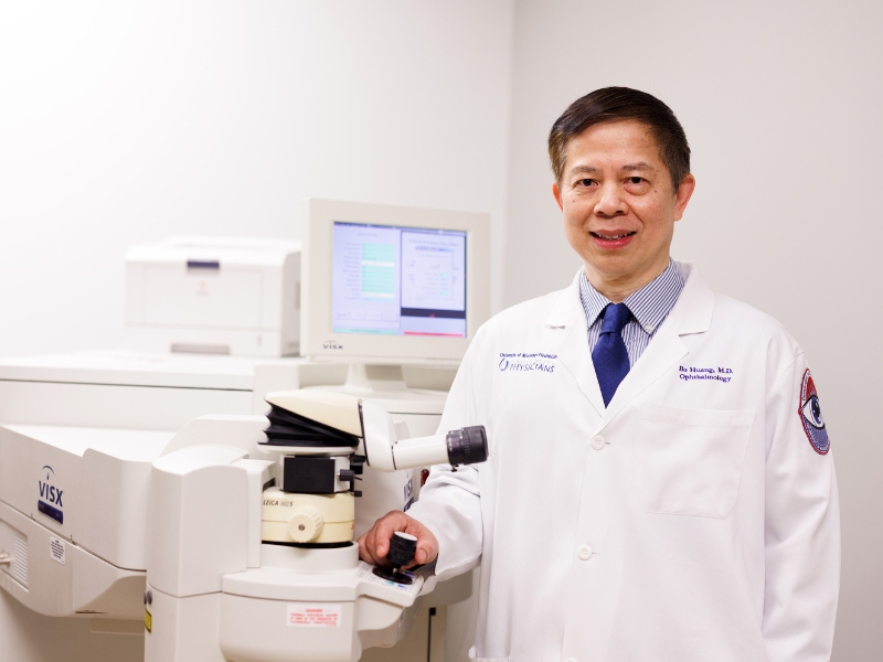 Cornea transplant expert Dr. Bo Huang, who arrived at the Medical Center more than two decades ago, is still "fascinated" with a profession that gives him "the ability to save people's sight."
