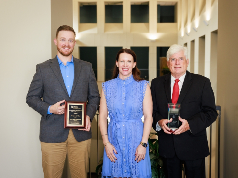 The School of Graduate Studies in the Health Sciences on Friday held its annual Distinguished Alumni Ceremony and Luncheon to honor Drs. Joey Granger and Jared Cobb with alumni awards for 2025. From left are Cobb, Dr. Sydney Murphy and Dr. Joey Granger.