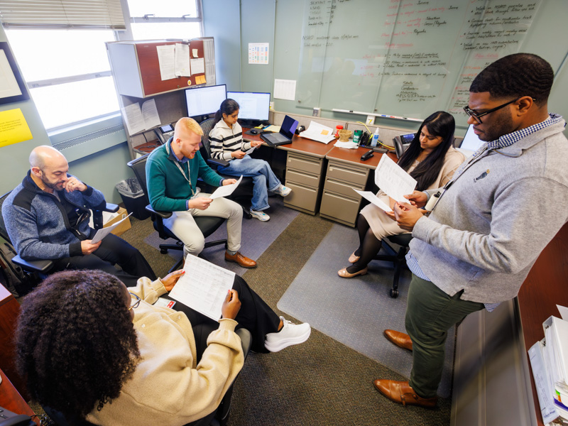 Orthopaedic research team members meet to discuss current projects. They are, clockwise from bottom left, Fibiana Oladipo, Researcher III; Caesar Alshibi, a clinical research manager; Dr. Johnathan Riley, research fellow; Sheetal Chowdhury, graduate student; Priyanka Nehete, clinical research manager; and Dr. Clarence Clark II, research fellow.