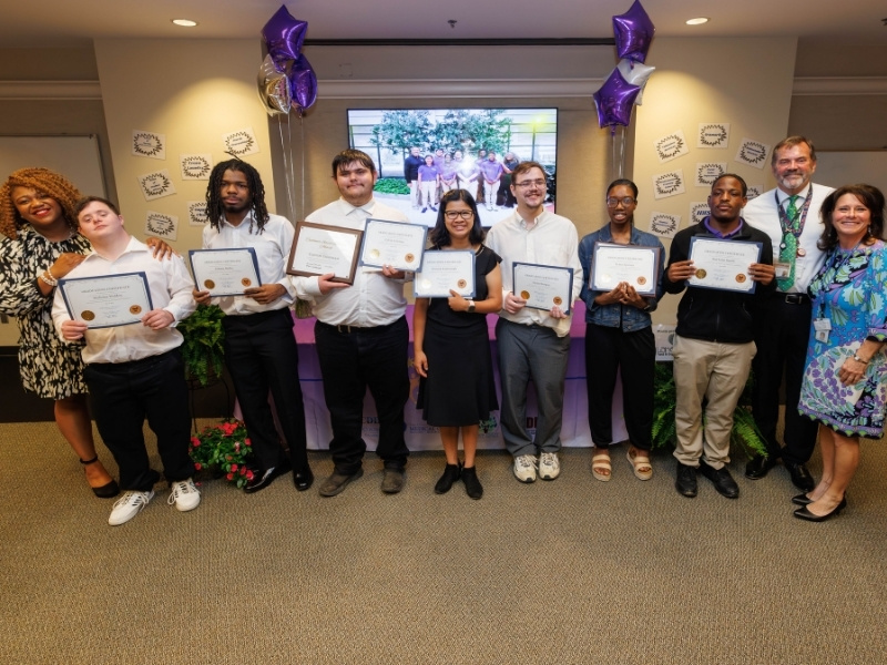 2026 Project SEARCH coordinators and graduates, from left, Jasmine Lee, Nick Weldon, Johnny Bailey, Calvin Coleman, Hannah Kimbrough, Dylan Morgan, Tyniya Spencer, Dai'Jawn "Bizzy" Smith, Tommy Burnham and Christina Guarino.