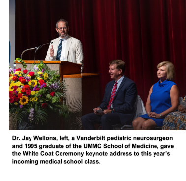 Dr. Jay Wellons, left, a Vanderbilt pediatric neurosurgeon and 1995 graduate of the UMMC School of Medicine, gave the white coat ceremony keynote address to this year’s incoming medical school class.