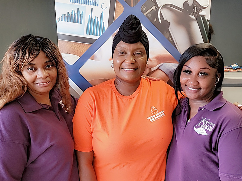 Group picture of three event faciltators.
