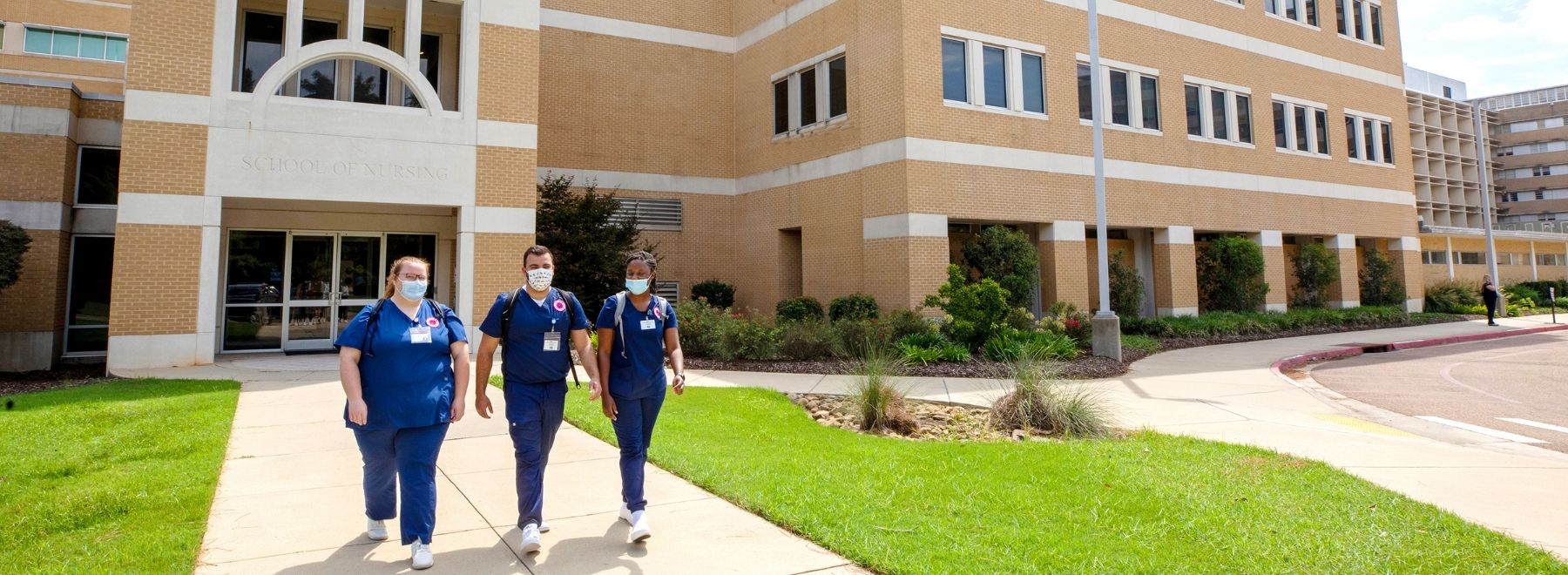 Students walking from the School of Nursing