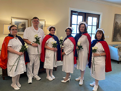 Mississippi Nurse Honor Guard paying respects at a fellow nurse's funeral.