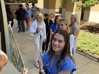 nursing students take photos of their ice cream to share on social media